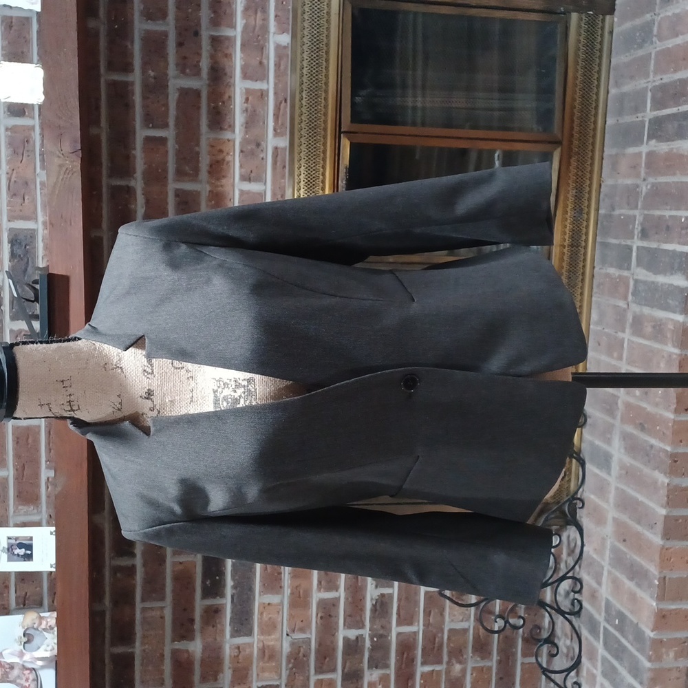 Ladies business pant/jacket suit. Brand new with tags.  Shade of dark brown.